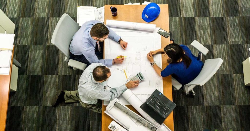 role of quantity surveyor 3 peoples people sit together