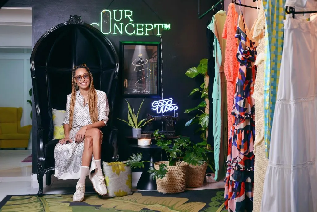 Woman Sitting in a Boutique with Dresses, Commercial Fit Outs For Business, Brand