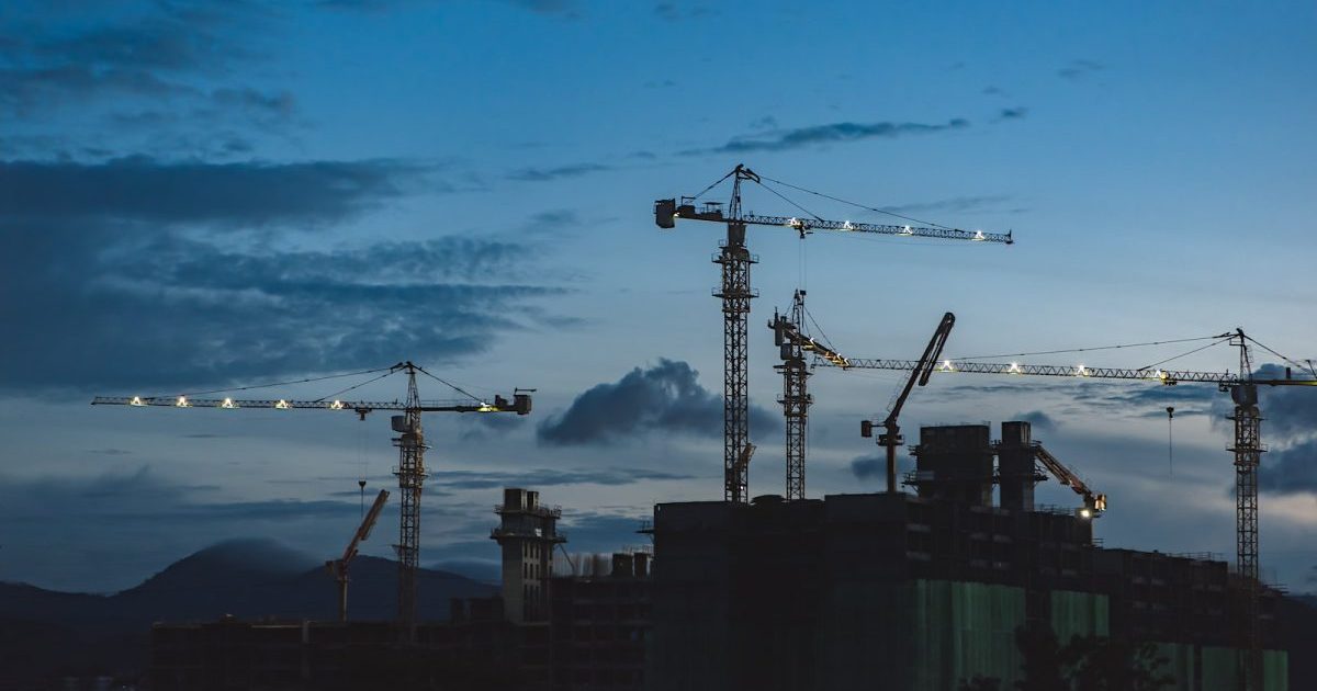 several cranes above the buildings, construction site security systems , Time lapse camera