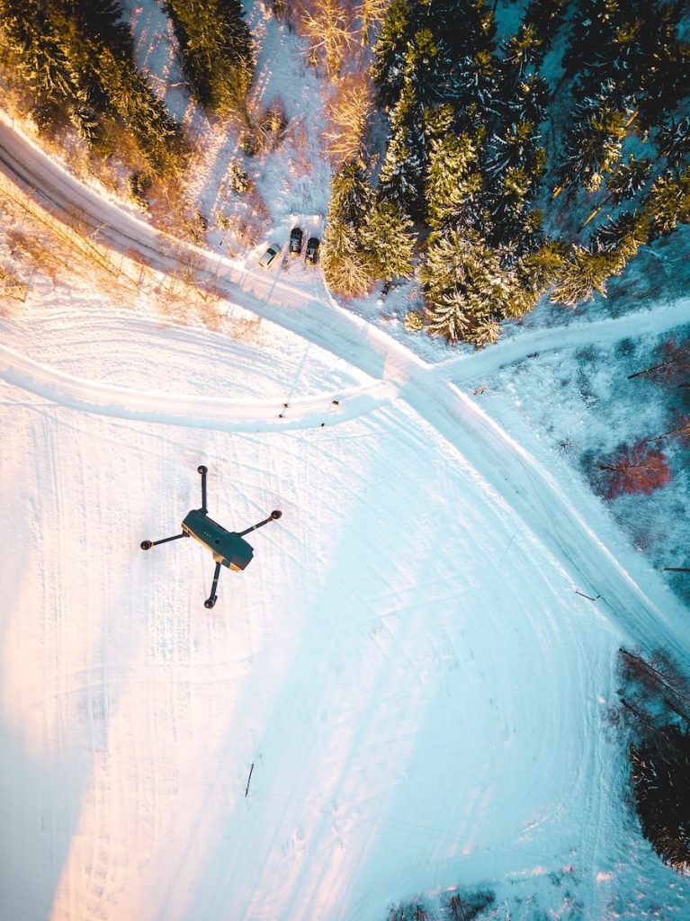  - Drone mapping, drones for surveyingblack quadcopter drone flying over snow field during daytime