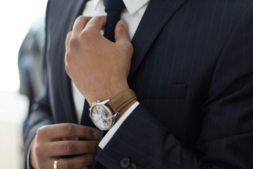 man wearing watch with black suit, Good Professional Practice